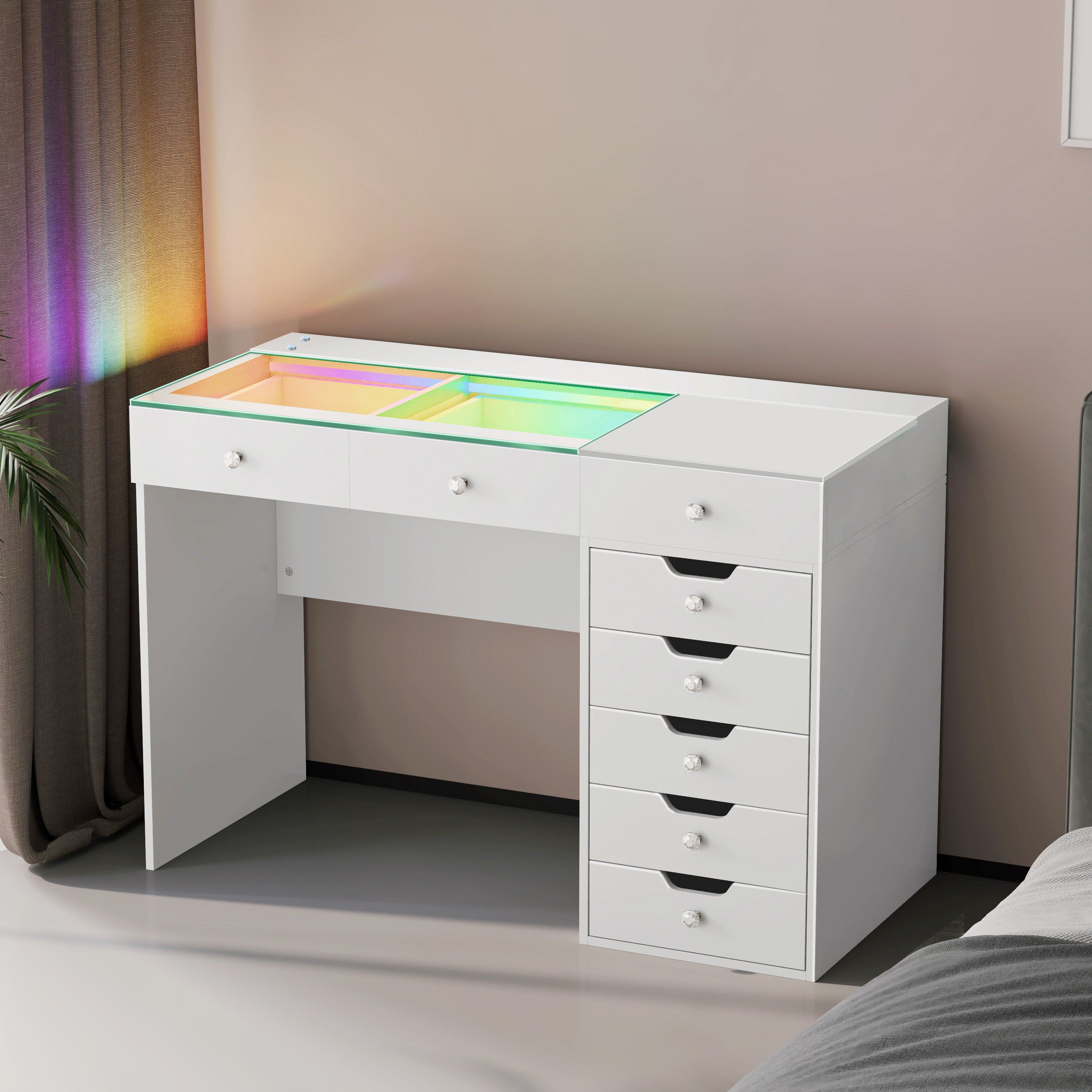 VANITII Diana Vanity Desk features 8 storage drawers,RGB strip light,clear tempered glass top and so on.The overall design is simple and white in color.Placed in the bedroom, it is both beautiful and practical.
