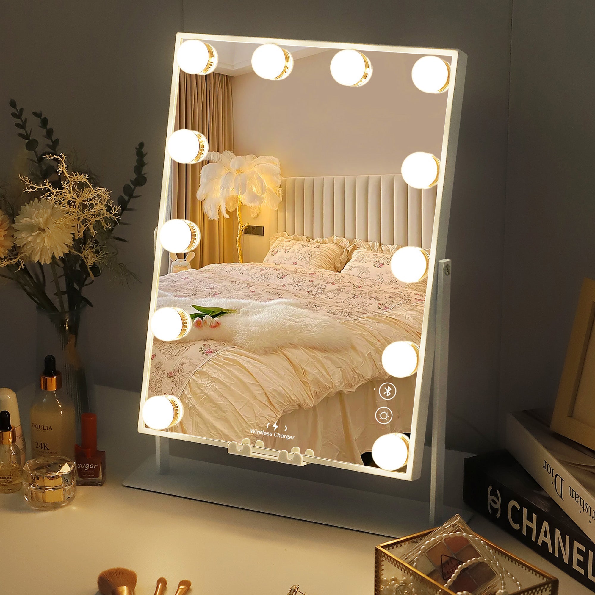 VANITII Hathaway Slim Vanity Mirror reflecting elegant bedroom decor with dimmable LED bulbs